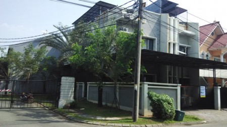 Rumah di jalan utama