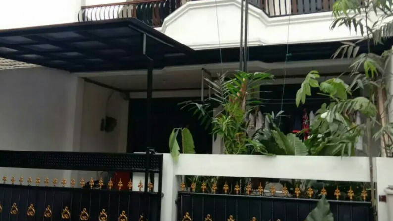 rumah siap huni row jalan besar di Griya Loka